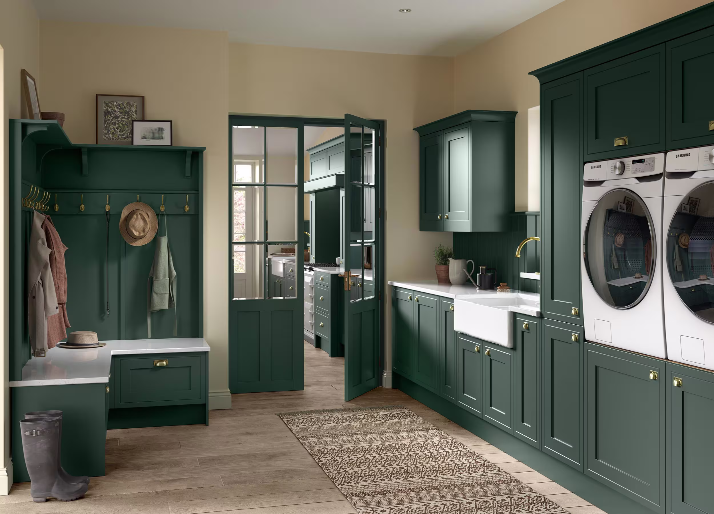 Galley style utility room with boot room area with dark, heritage green cupboard doors
